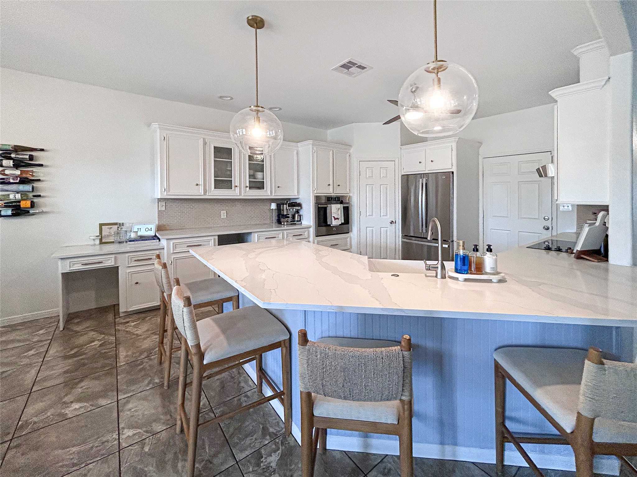 626 Sunset Trail Angleton, TX 77515 - Photo 15 of 43 a view of a dining room and a kitchen area