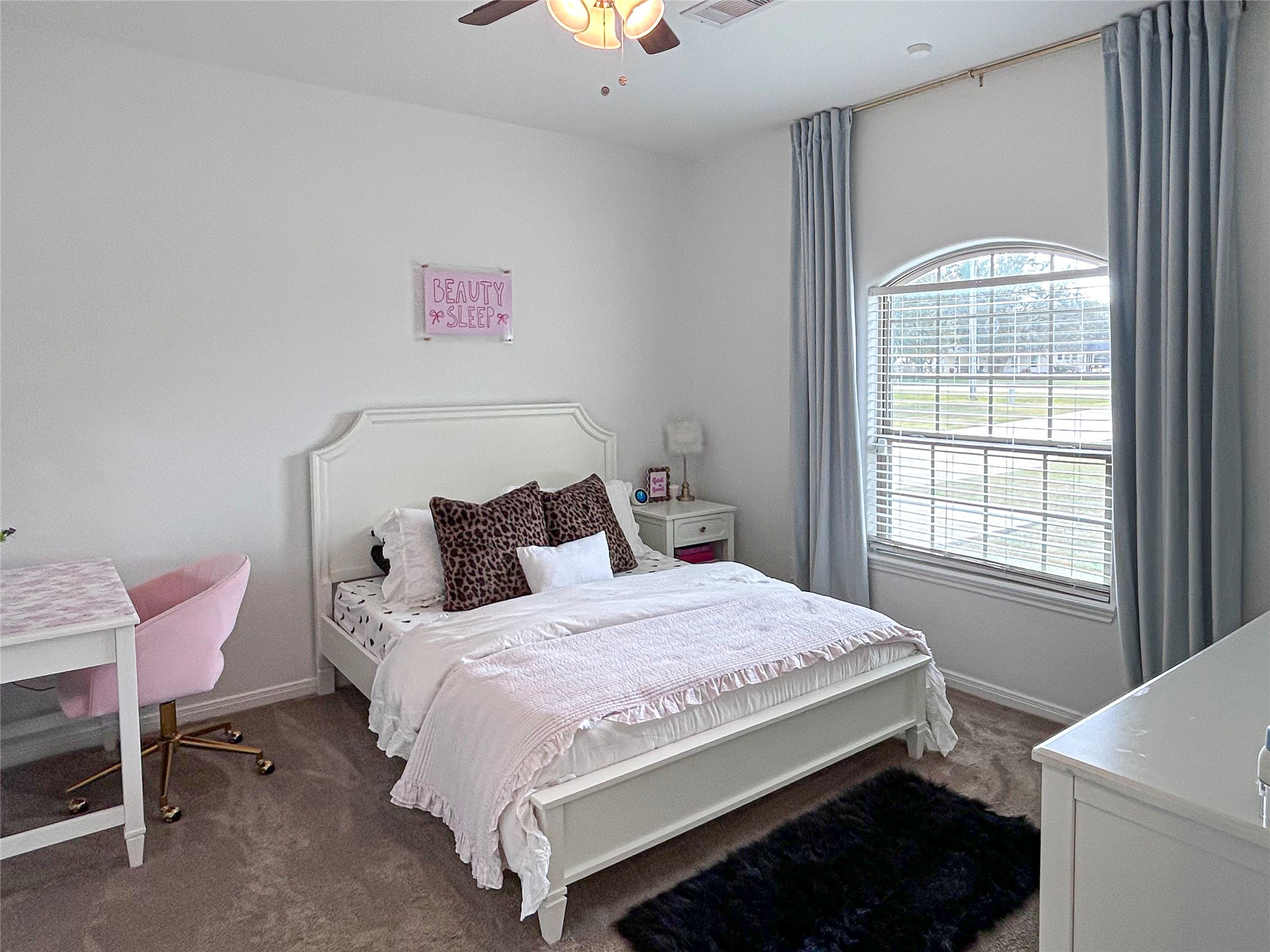 626 Sunset Trail Angleton, TX 77515 - Photo 25 of 43 a bedroom with a bed and a window