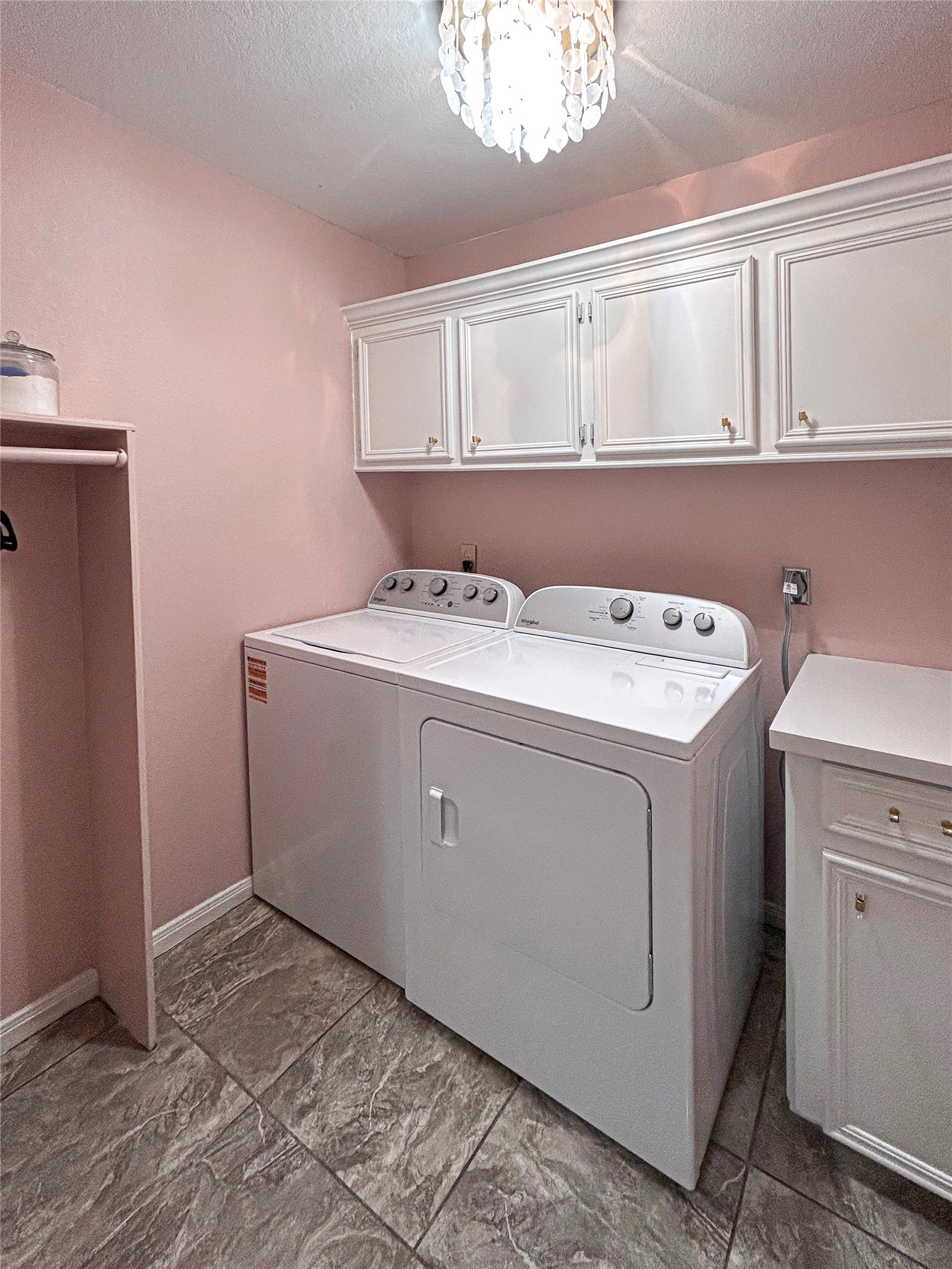 626 Sunset Trail Angleton, TX 77515 - Photo 28 of 43 a utility room with dryer and washer