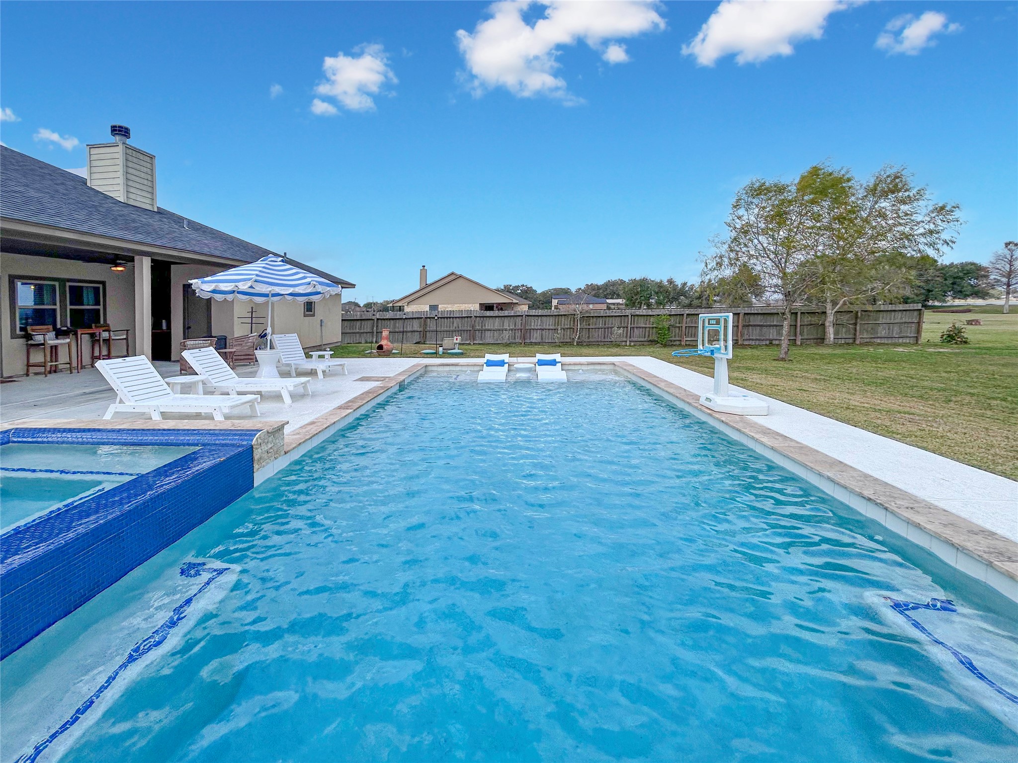 626 Sunset Trail Angleton, TX 77515 - Photo 30 of 43 a view of a house with lounge chair and dinning table
