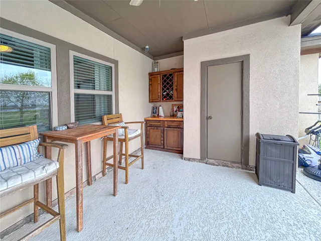 a view of a livingroom with furniture and window