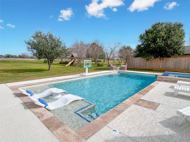 a view of an outdoor space and swimming pool