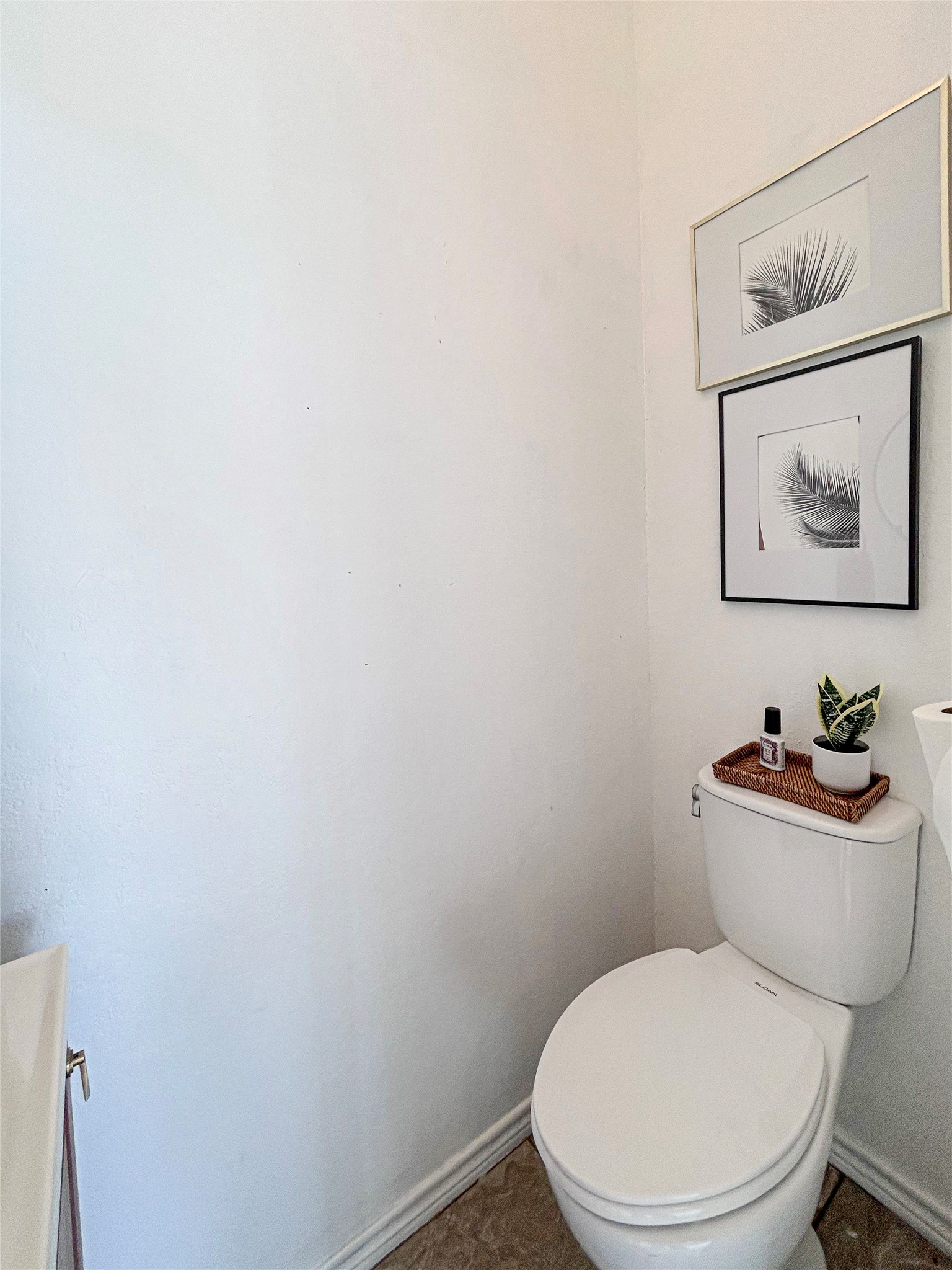 626 Sunset Trail Angleton, TX 77515 - Photo 39 of 43 a white toilet sitting next to a white sink and vanity