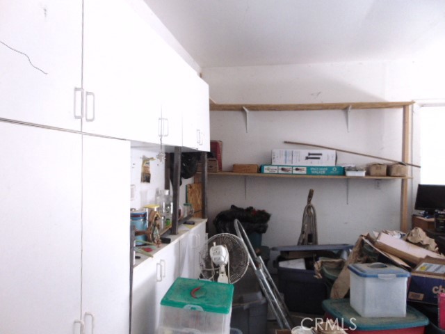 3835 Gardiner Ferry Road, Unit 62 Corning, CA 96021 - Photo 32 of 34 a kitchen with a sink a stove and a window