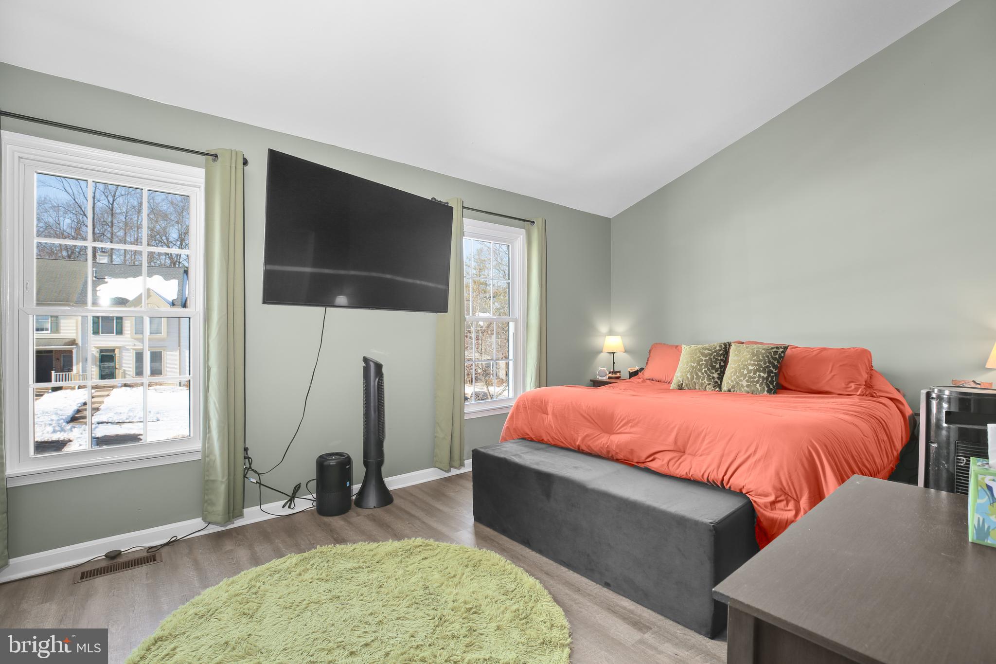 12385 Manchester Way Woodbridge, VA 22192 - Photo 13 of 32 a bedroom with a bed and a flat screen tv