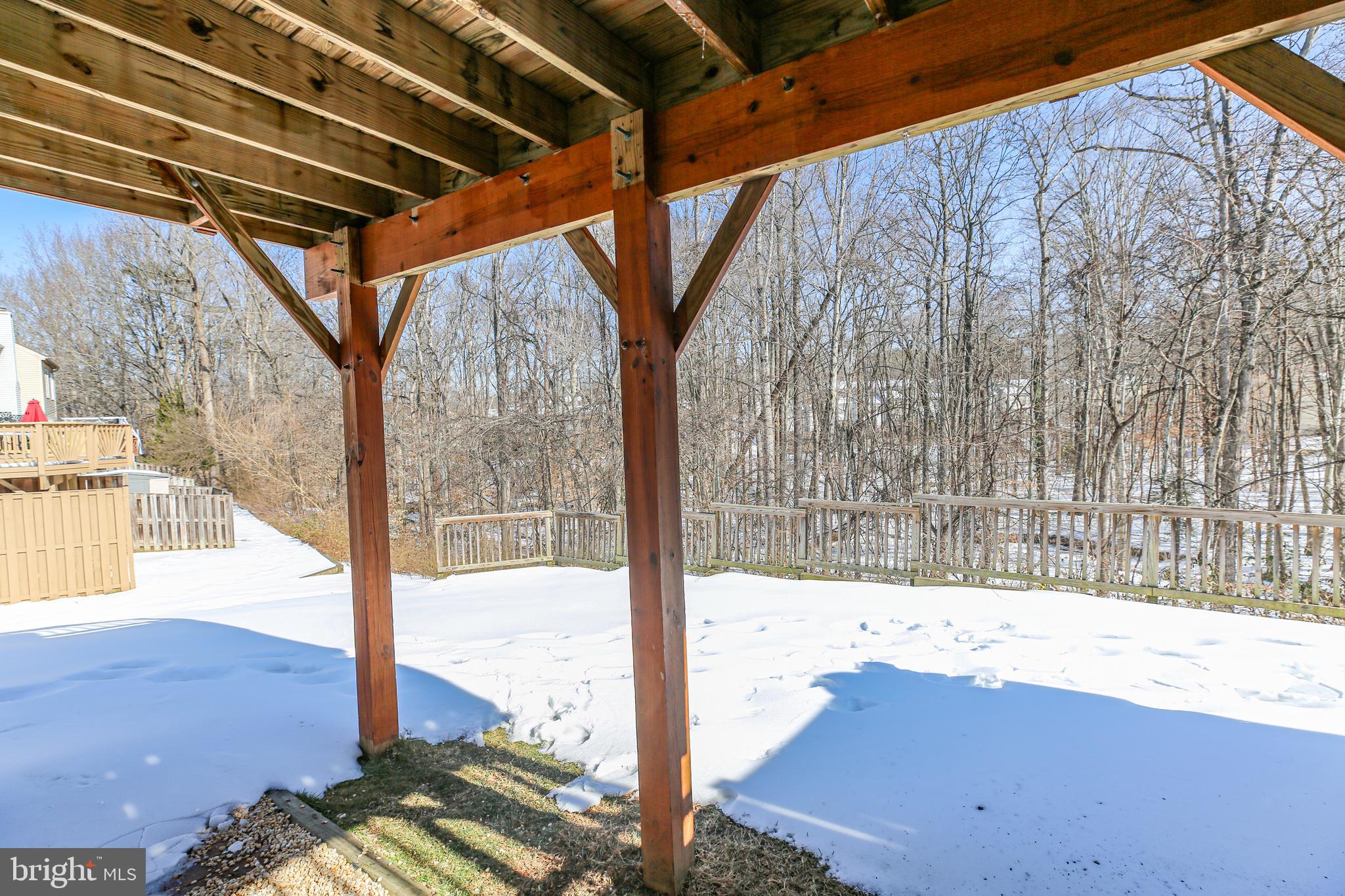 12385 Manchester Way Woodbridge, VA 22192 - Photo 32 of 32 a view of a backyard of the house