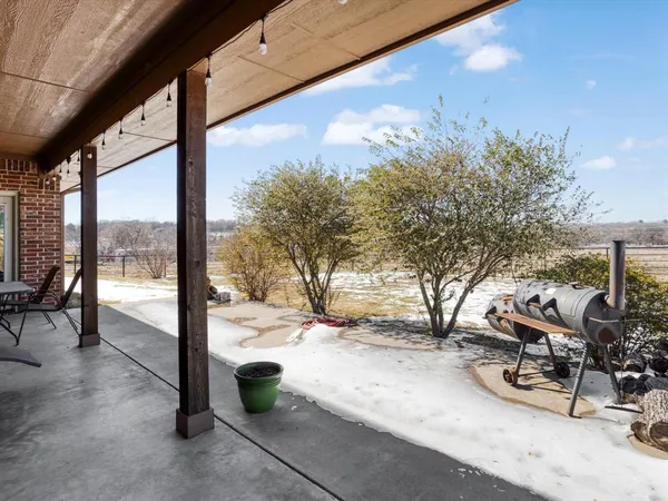 a view of outdoor space with seating area