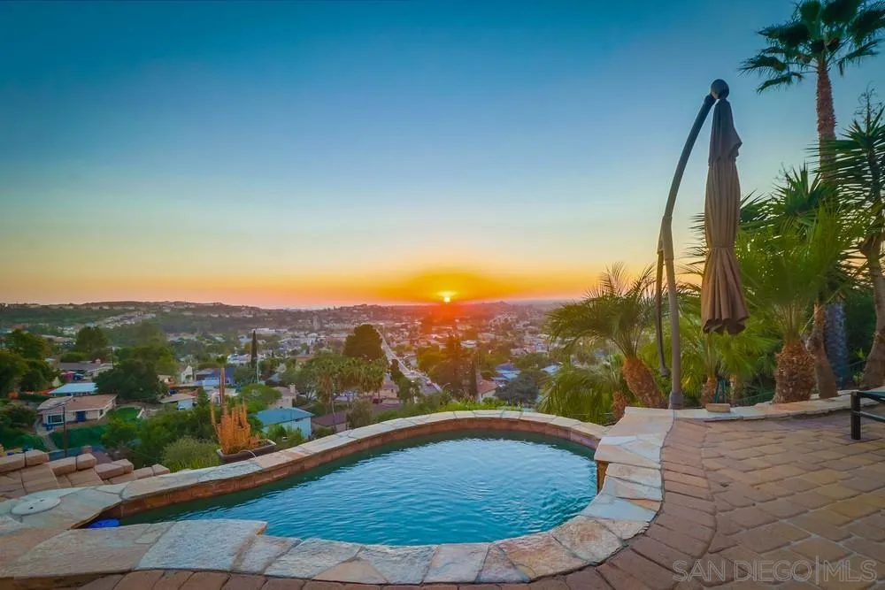 7970 Pasadena Avenue La Mesa, CA 91941 - Photo 17 of 38 an aerial view of a house with a yard and lake view