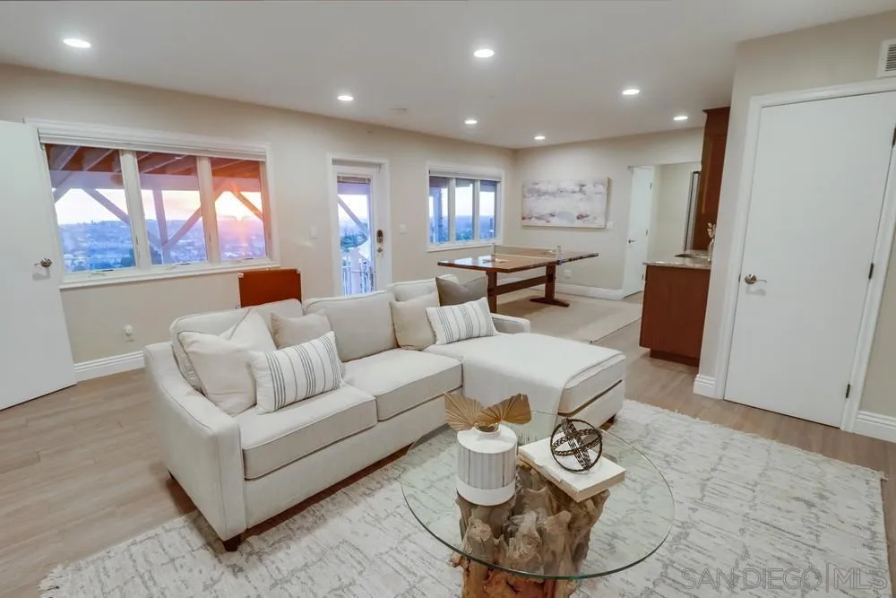 7970 Pasadena Avenue La Mesa, CA 91941 - Photo 23 of 38 a living room with furniture and a window
