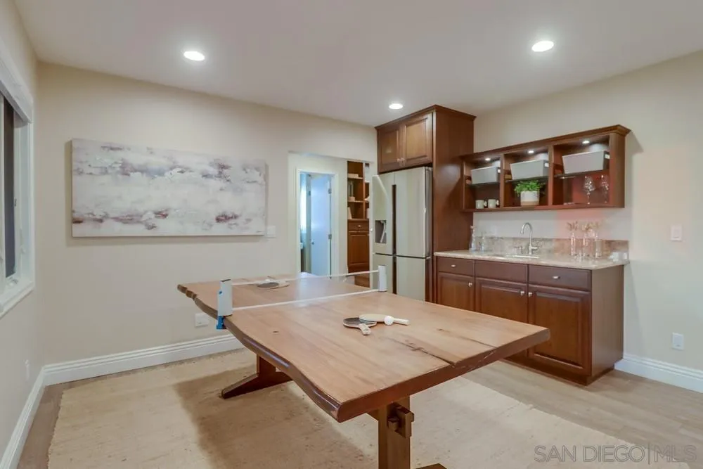 7970 Pasadena Avenue La Mesa, CA 91941 - Photo 24 of 38 a view of a kitchen with a table and chairs