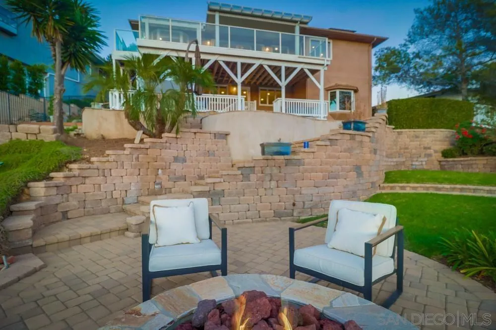 7970 Pasadena Avenue La Mesa, CA 91941 - Photo 30 of 38 a front view of a house with garden