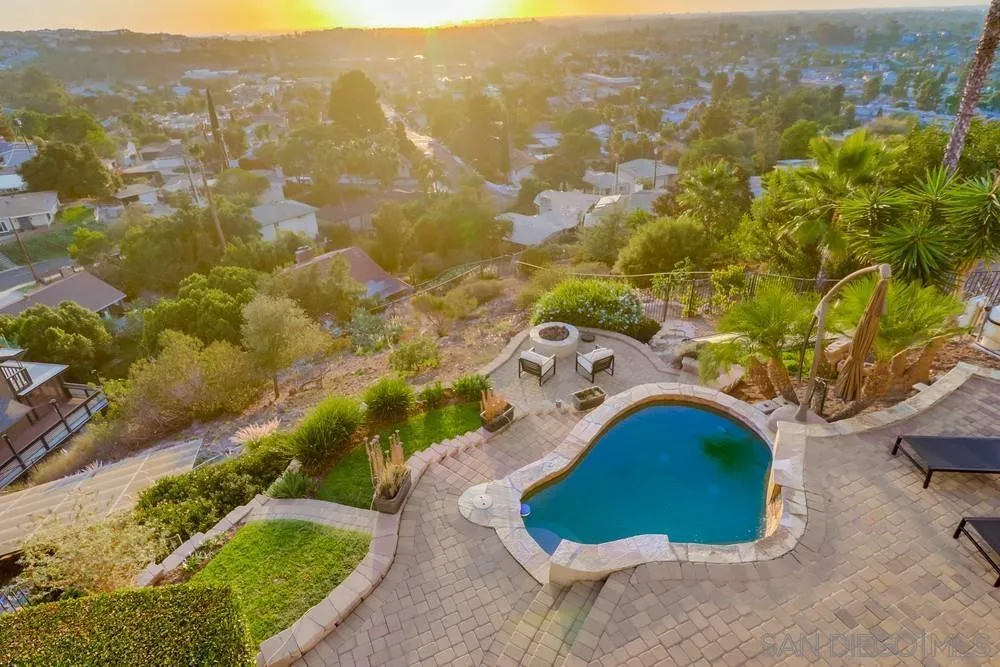 7970 Pasadena Avenue La Mesa, CA 91941 - Photo 32 of 38 an aerial view of a house with a yard and lake view