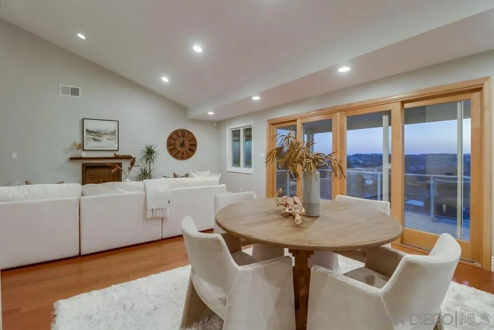 7970 Pasadena Avenue La Mesa, CA 91941 - Photo 5 of 38 a kitchen with a table and chairs in it