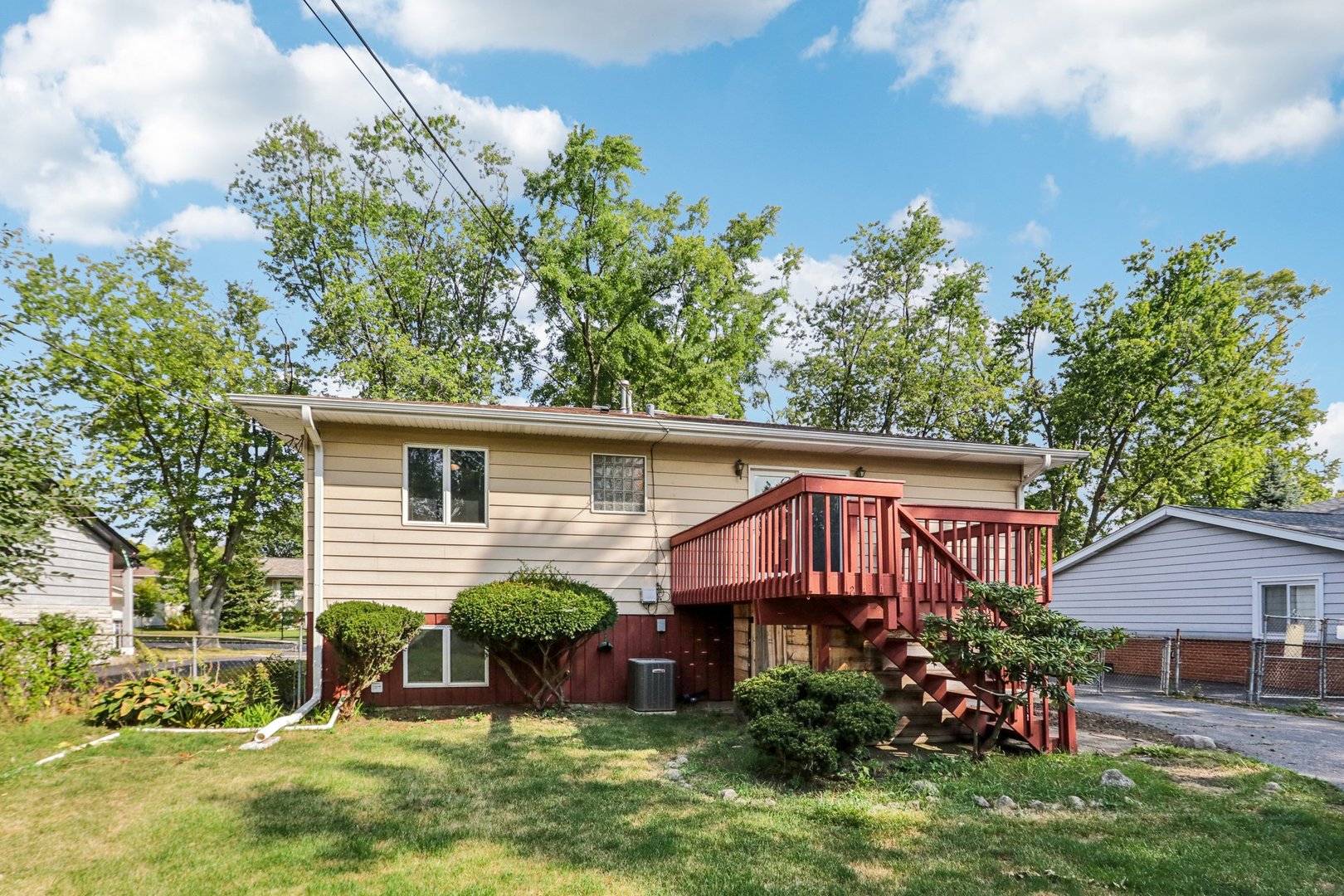 2405 Martin Lane Rolling Meadows, IL 60008 - Photo 20 of 22 a front view of a house with garden