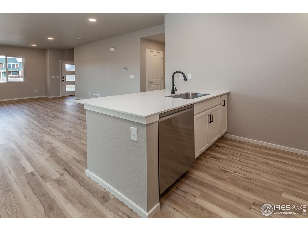 6929 4th St Road, Unit 1 Greeley, CO 80634 - Photo 14 of 38 EXAMPLE PHOTO: KITCHEN ISLAND