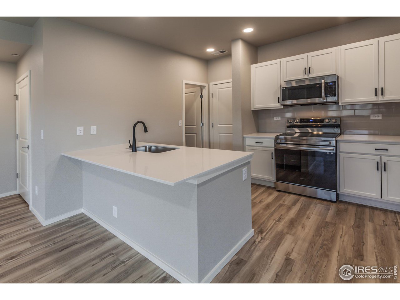 6929 4th St Road, Unit 1 Greeley, CO 80634 - Photo 17 of 38 EXAMPLE PHOTO: KITCHEN