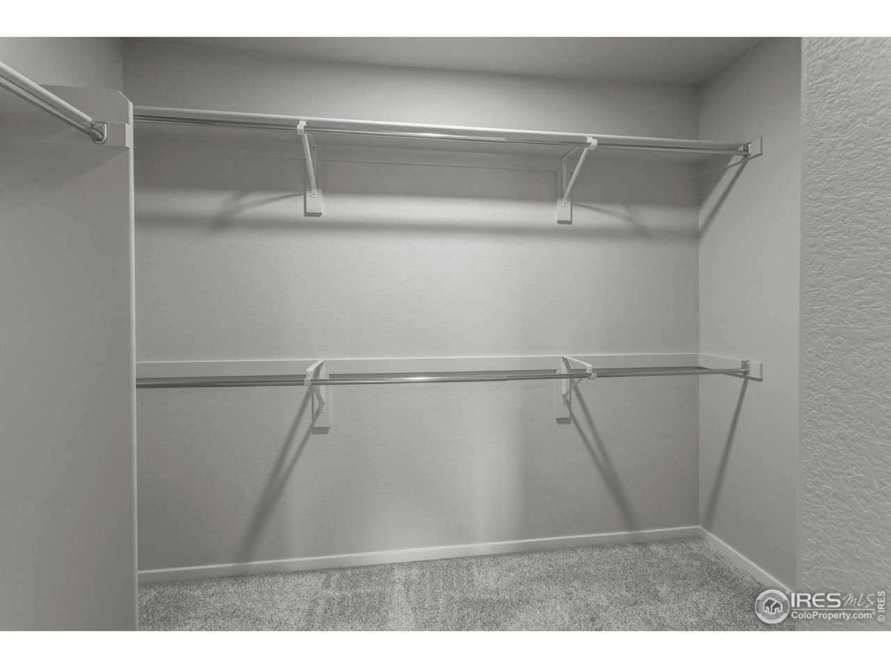 6929 4th St Road, Unit 1 Greeley, CO 80634 - Photo 27 of 38 EXAMPLE PHOTO: MASTER BEDROOM WALK IN CLOSET