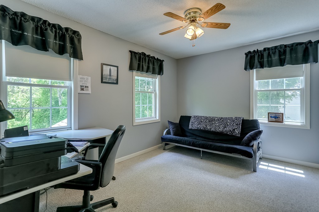 47 Babcock Tavern Road Ware, MA 01082 - Photo 18 of 27 a living room with furniture and a window