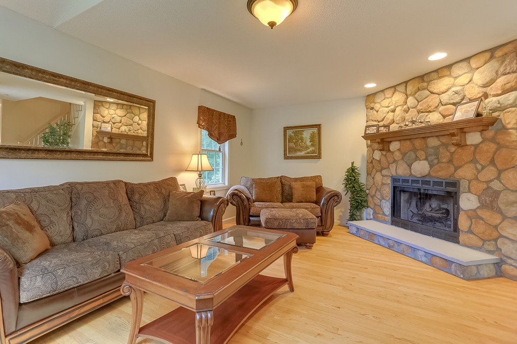 47 Babcock Tavern Road Ware, MA 01082 - Photo 2 of 27 a living room with furniture and a fireplace