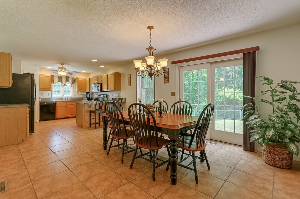 47 Babcock Tavern Road Ware, MA 01082 - Photo 7 of 27 a dining room with furniture a chandelier and view