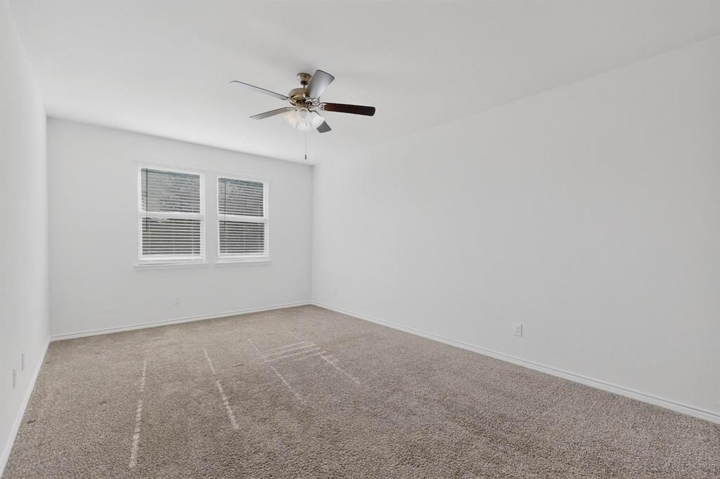2917 Lampasas Lane Little Elm, TX 75068 - Photo 16 of 36 a view of an empty room with a window