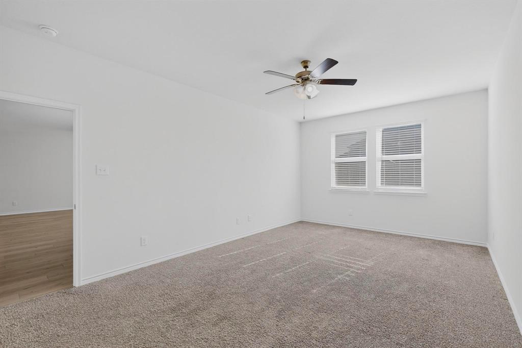 2917 Lampasas Lane Little Elm, TX 75068 - Photo 17 of 36 a view of an empty room with a window