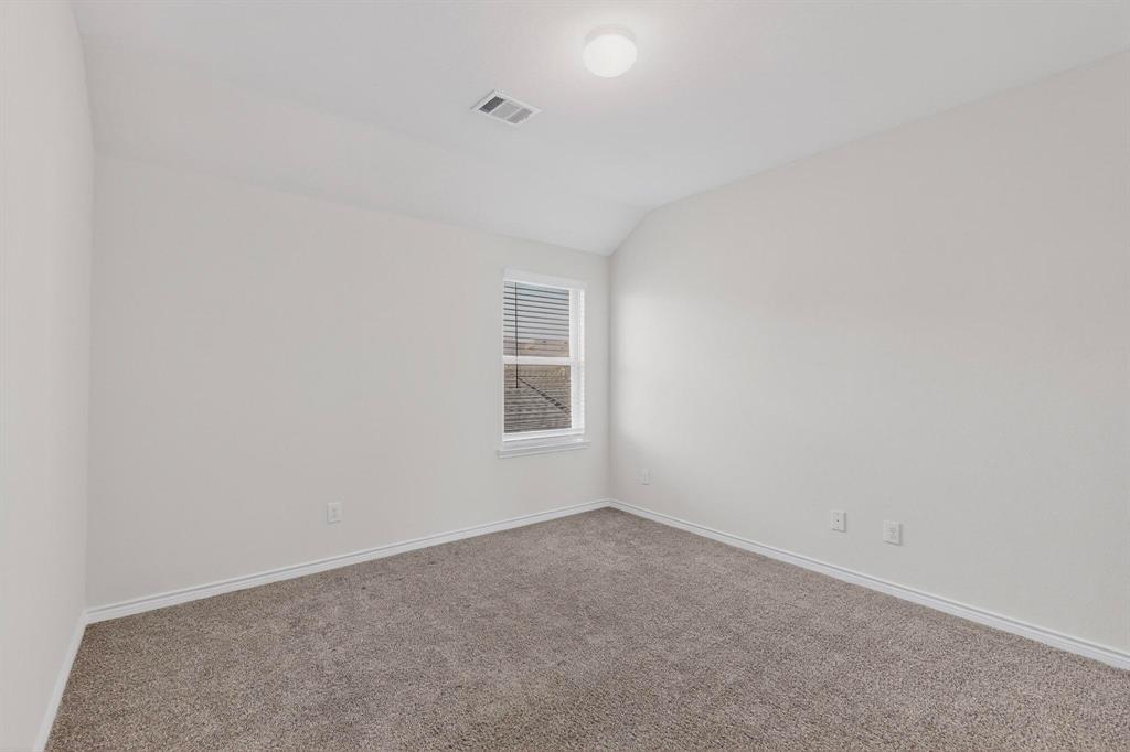 2917 Lampasas Lane Little Elm, TX 75068 - Photo 24 of 36 an empty room with a window