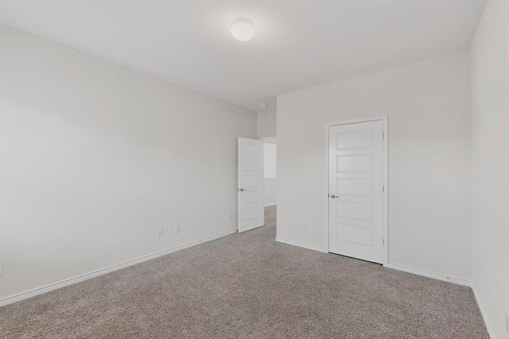 2917 Lampasas Lane Little Elm, TX 75068 - Photo 25 of 36 a view of an empty room