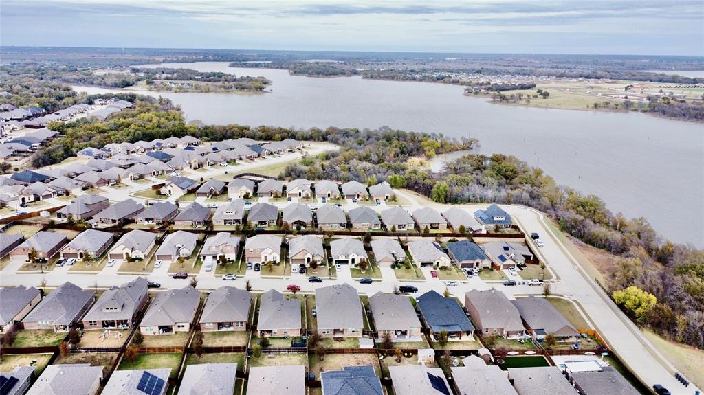 2917 Lampasas Lane Little Elm, TX 75068 - Photo 35 of 36 Aerial view of property's location with a large body of water and nearby suburban area