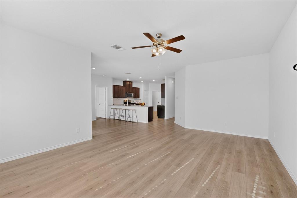 2917 Lampasas Lane Little Elm, TX 75068 - Photo 9 of 36 a view of empty room with wooden floor