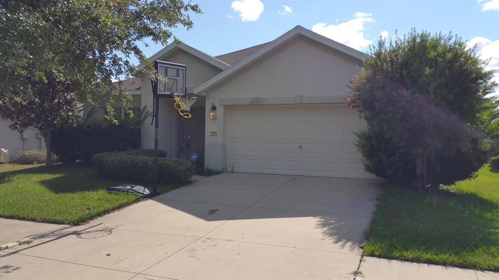 3930 Southwest 57th Terrace Ocala, FL 34474 - Photo 1 of 1 a view of a house with a yard