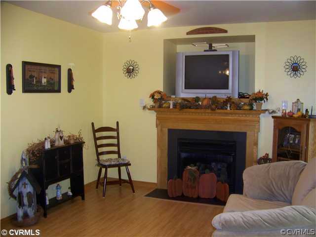 1500 West Rose Garden Road West Point, VA 23181 - Photo 2 of 12 Living Room - Living Room with Laminate Flooring,