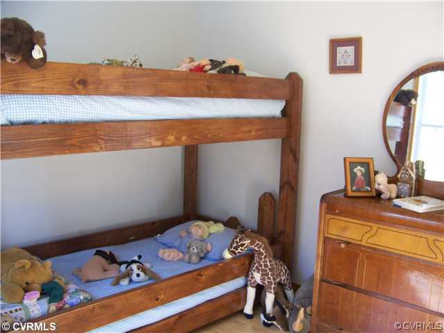 1500 West Rose Garden Road West Point, VA 23181 - Photo 5 of 12 Bedroom - 2nd Floor Bedroom with Laminate Flooring