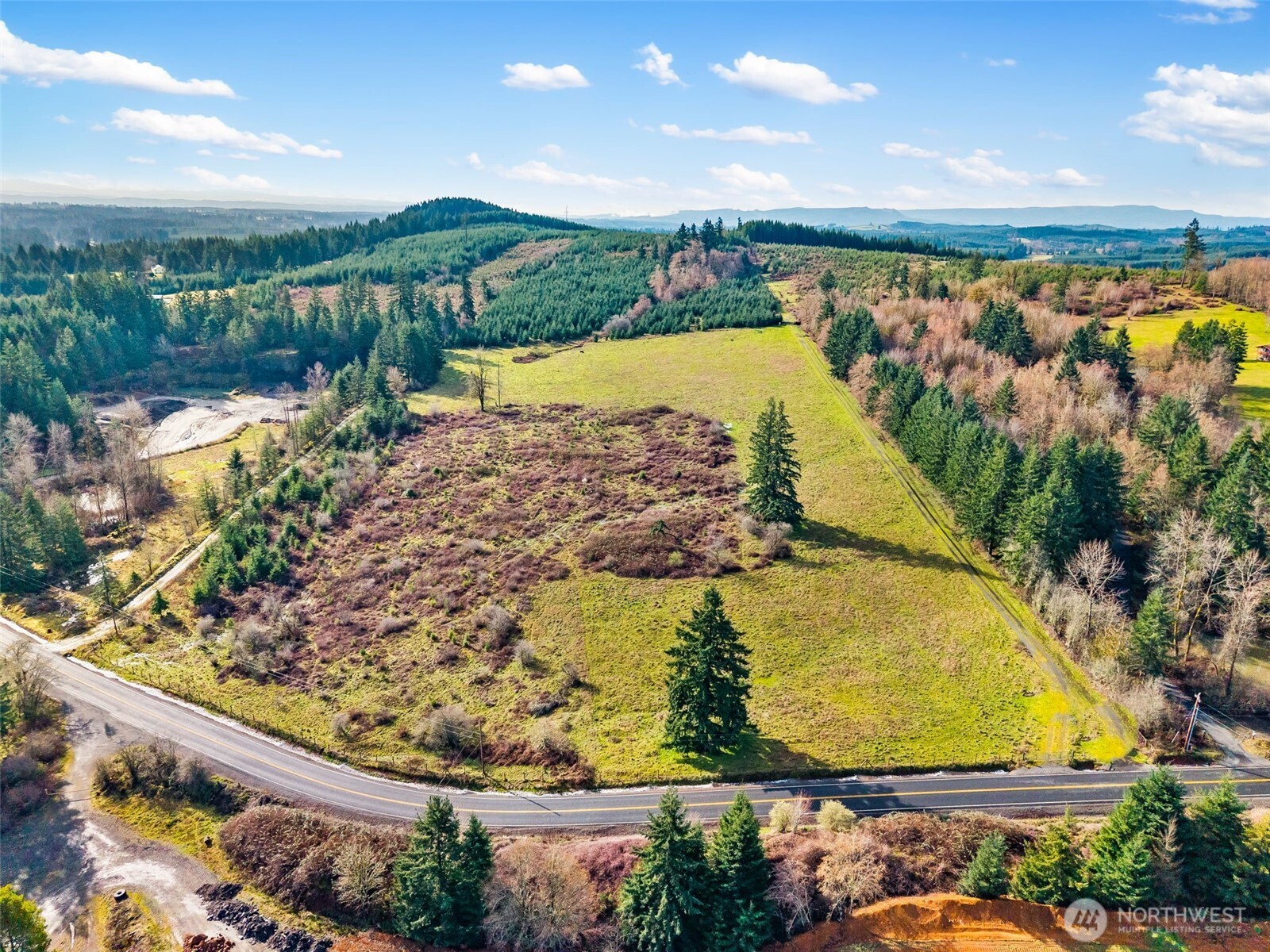 -xxx West Hale Road Winlock, WA 98596 - Photo 16 of 26 a view of a swimming pool with a back yard