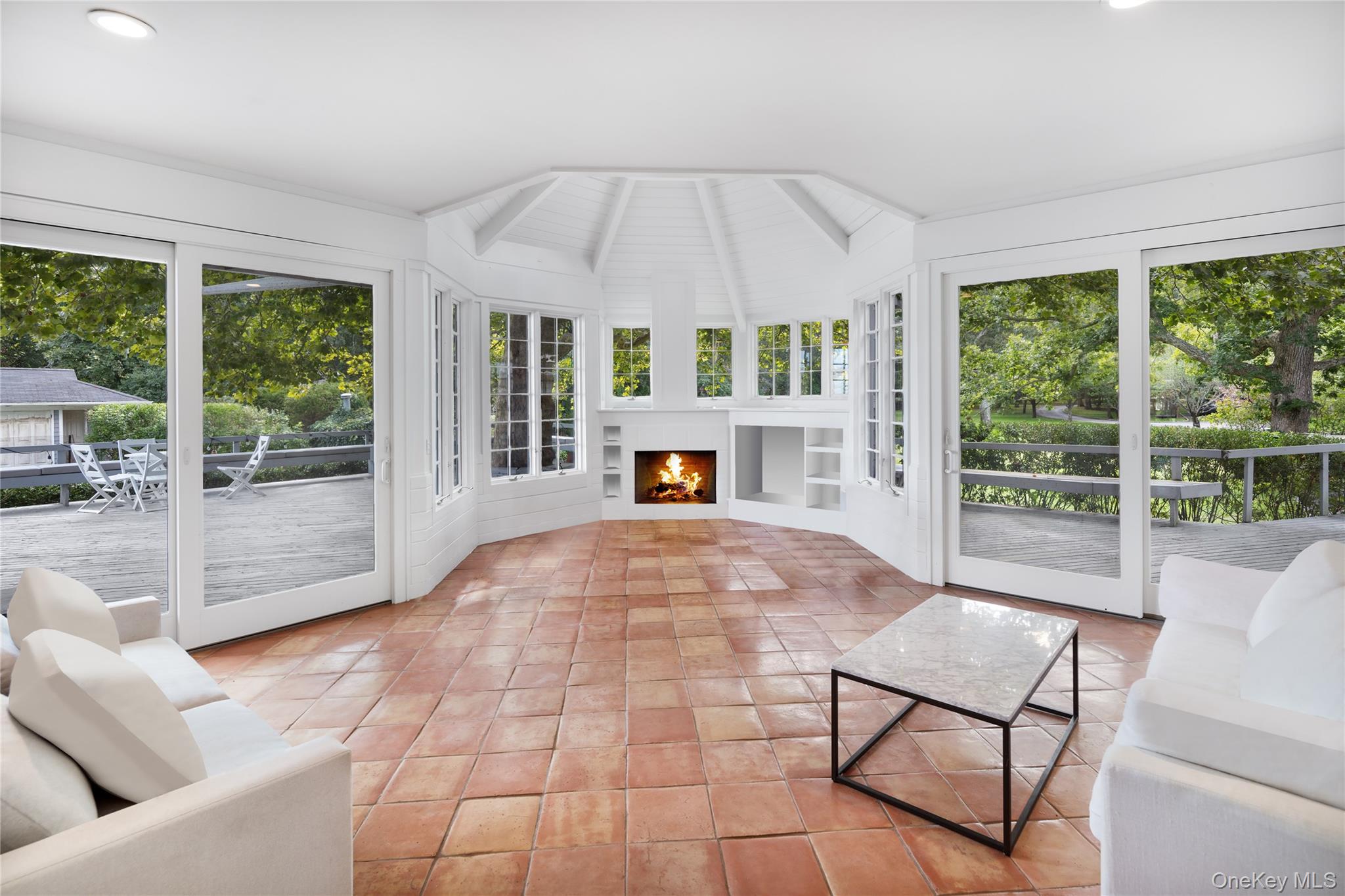 11 Bay Road Quogue, NY 11959 - Photo 13 of 41 a living room with furniture and a large window