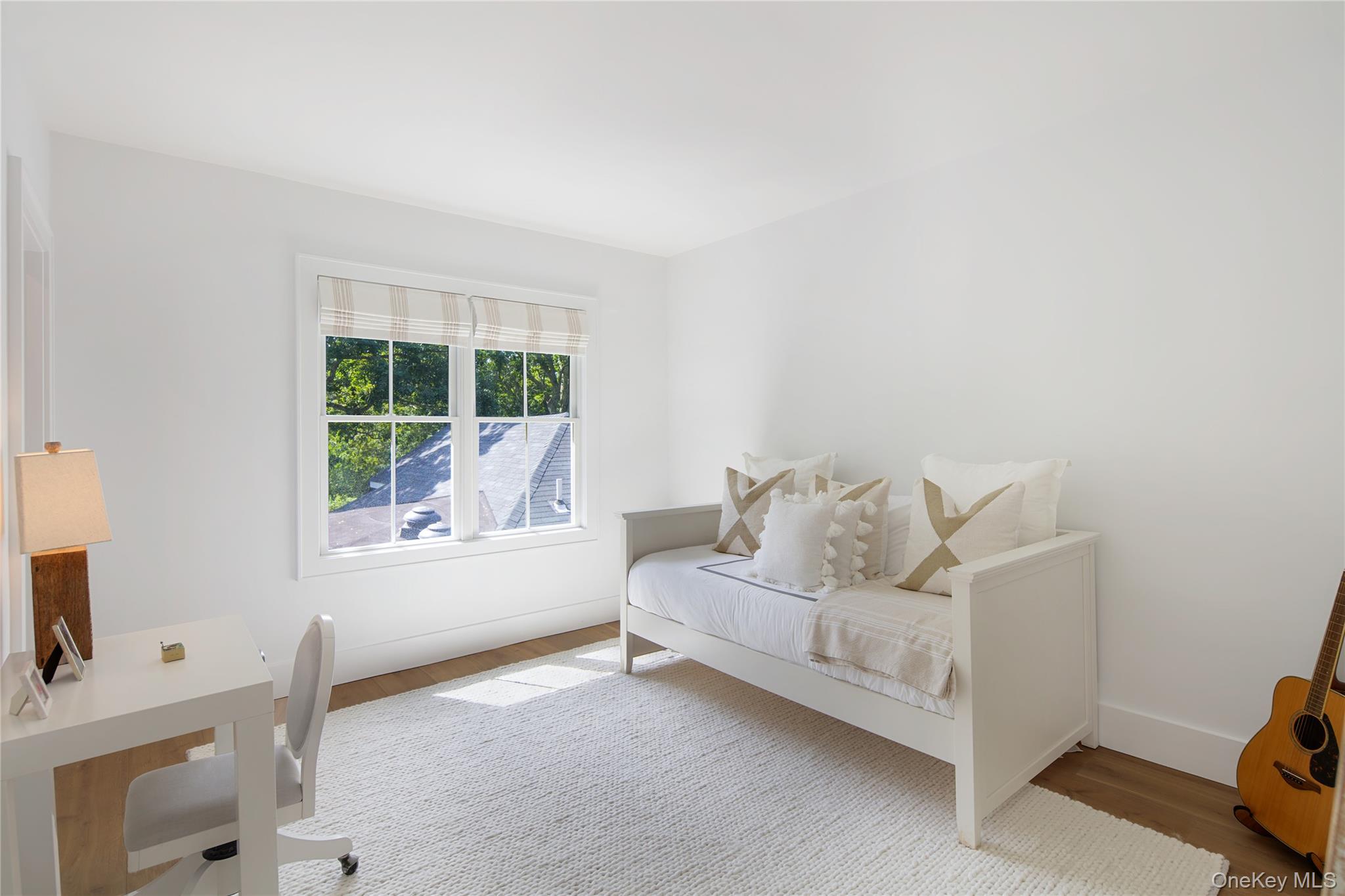 11 Bay Road Quogue, NY 11959 - Photo 21 of 41 a living room with furniture and a window