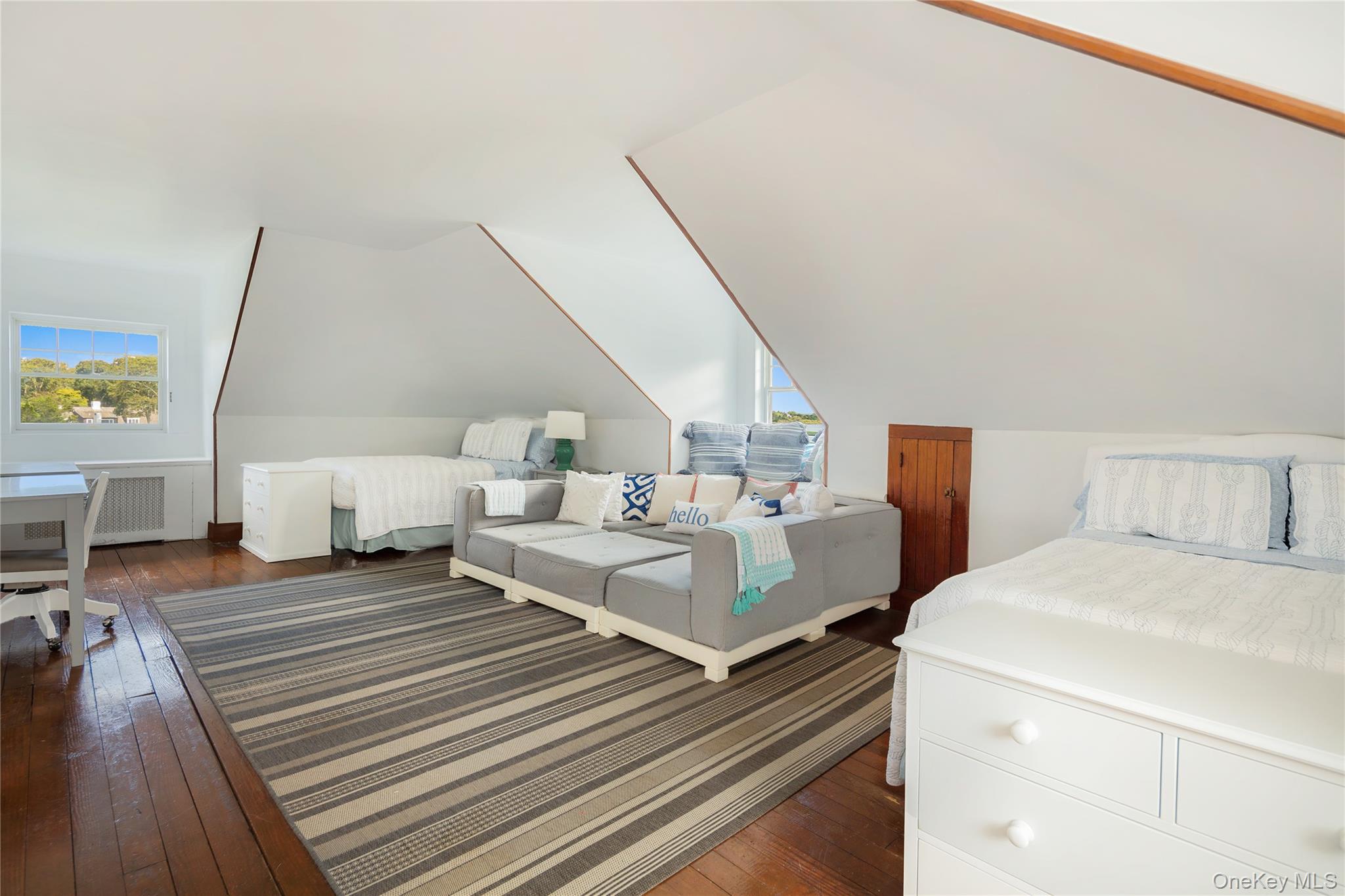 11 Bay Road Quogue, NY 11959 - Photo 24 of 41 a bed room with a bed and a night stand