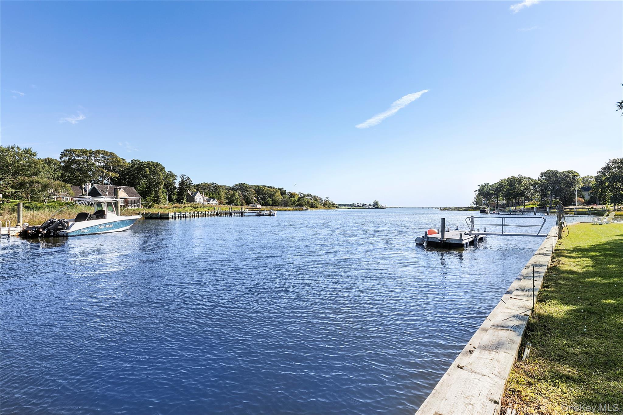11 Bay Road Quogue, NY 11959 - Photo 33 of 41 a view of a lake with houses