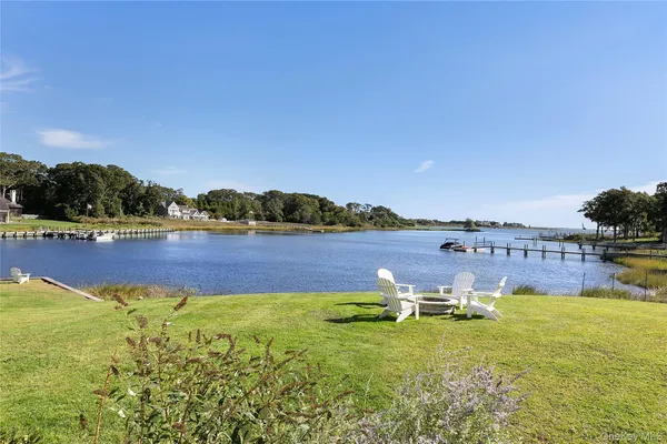 a view of a lake with a big yard
