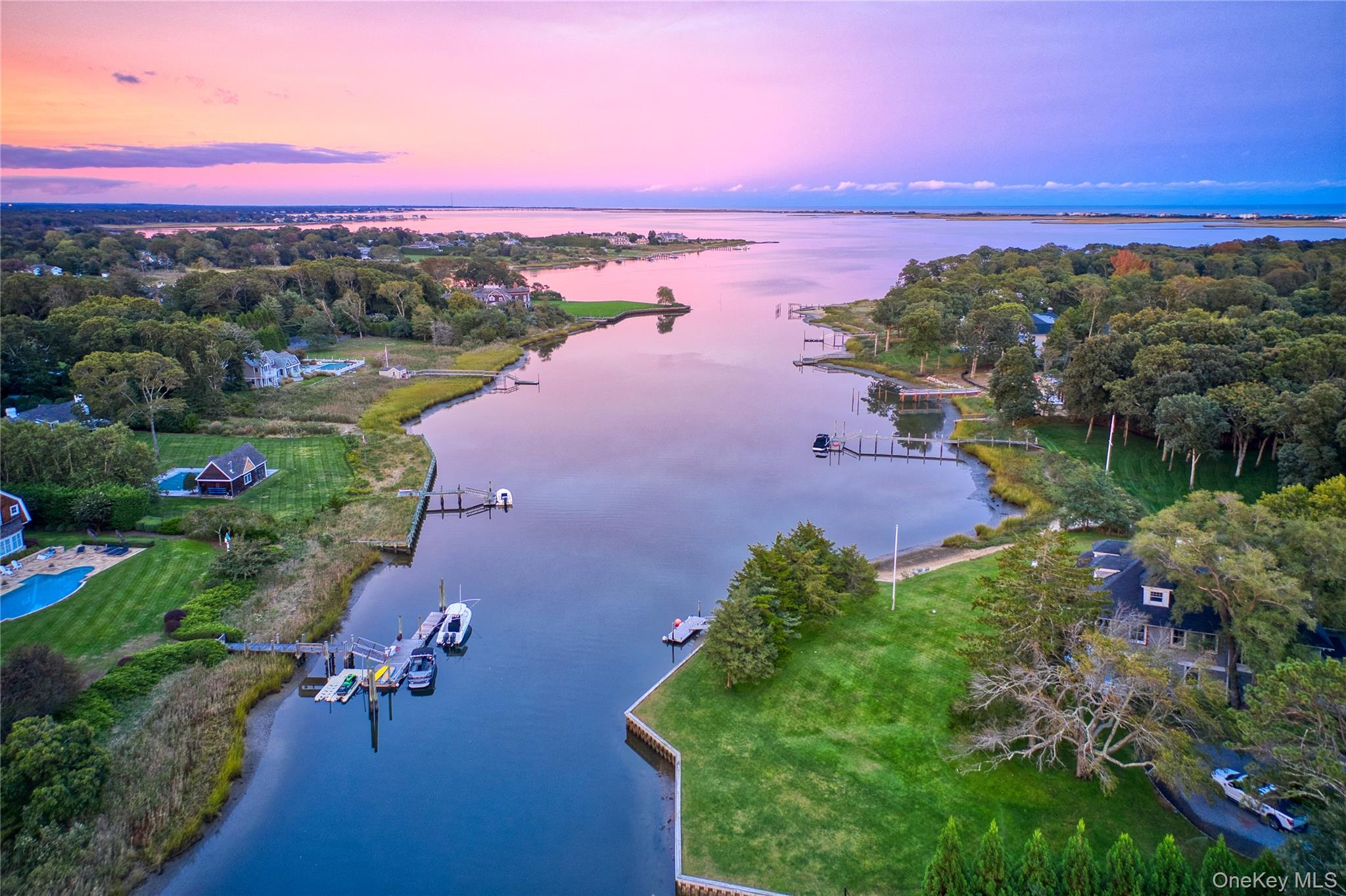 11 Bay Road Quogue, NY 11959 - Photo 38 of 41 a view of a city with a lake