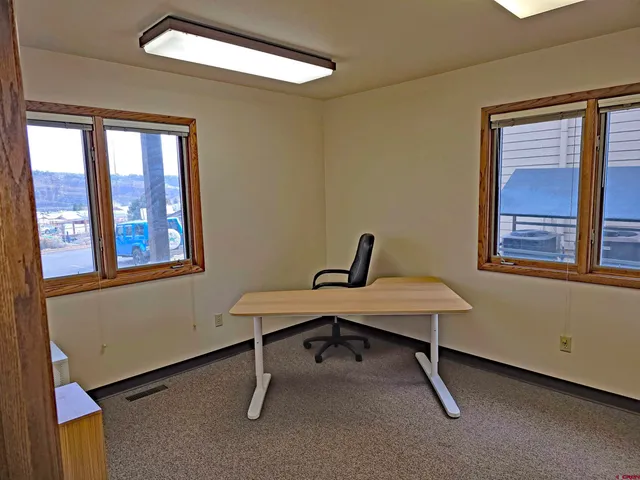 a view of a workspace with a window