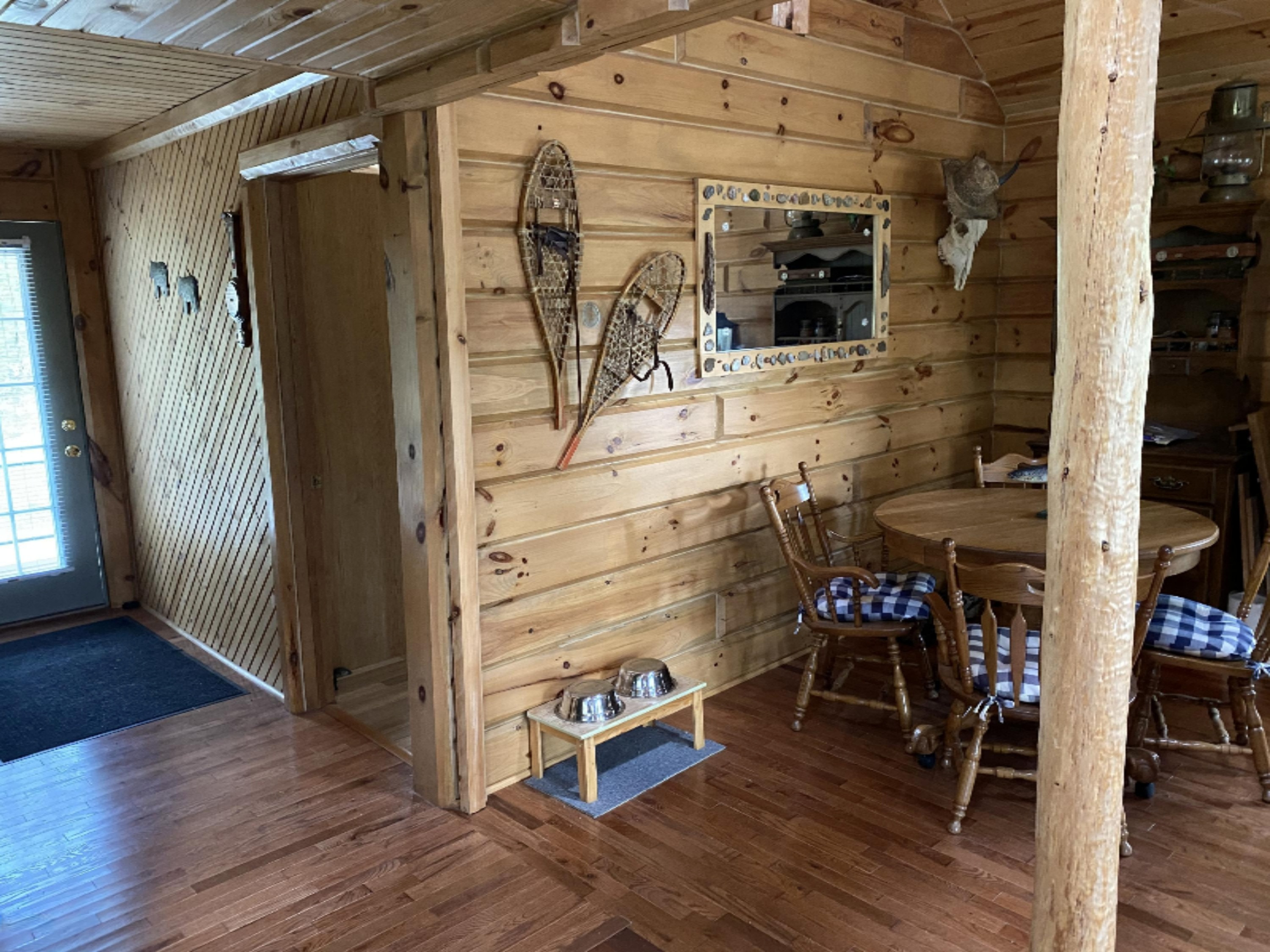 5093 East County Line Road Manistee, MI 49660 - Photo 23 of 52 Door in middle leads to "Bathroom"