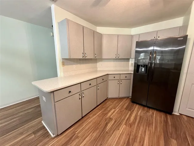 a bedroom with a bed and dresser