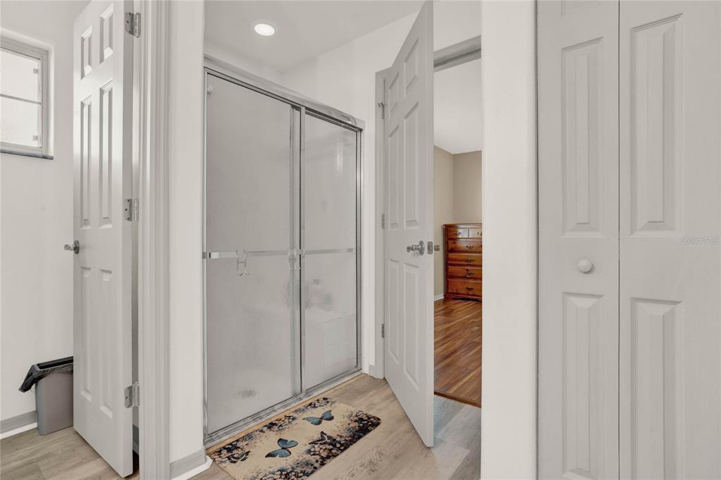 6008 Southwest 103rd Loop Ocala, FL 34476 - Photo 16 of 37 a view of a hallway with wooden floor and closet