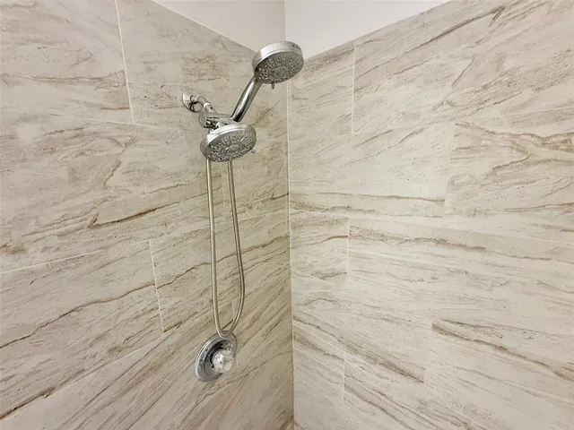 a bathroom with a sink a toilet and bathtub