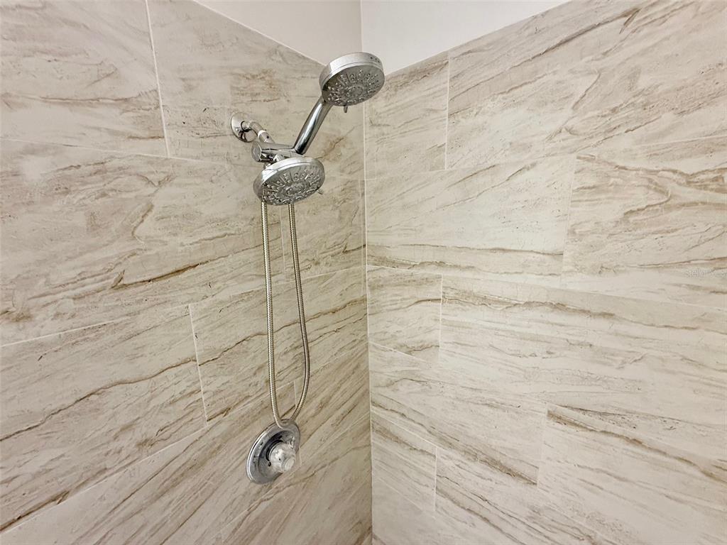 6008 Southwest 103rd Loop Ocala, FL 34476 - Photo 19 of 37 a bathroom with a shower