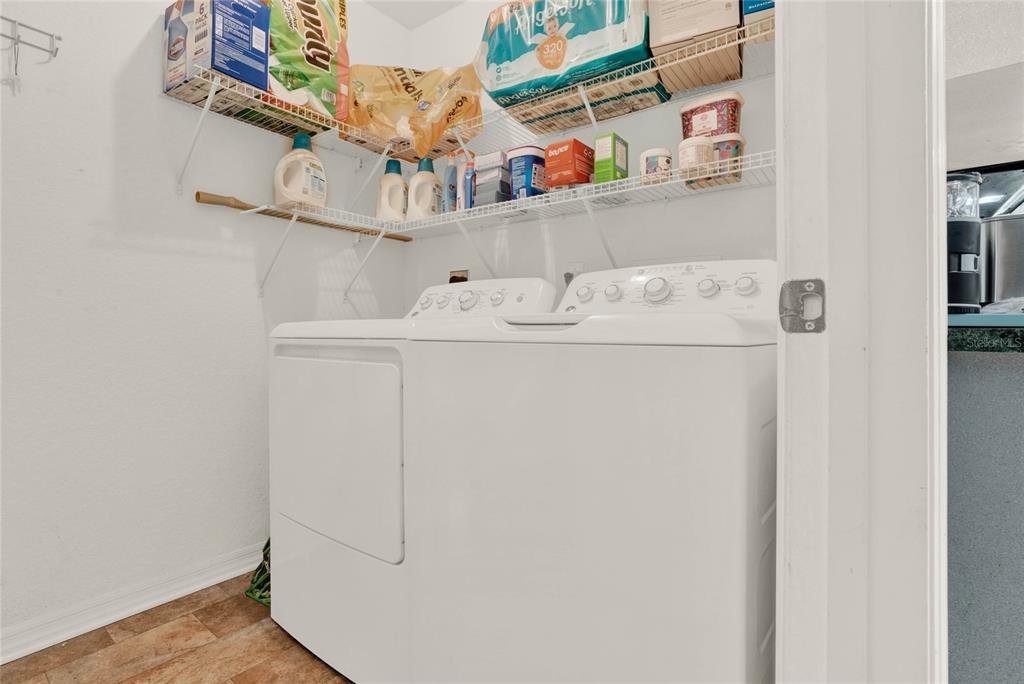 6008 Southwest 103rd Loop Ocala, FL 34476 - Photo 26 of 37 a utility room with dryer and washer