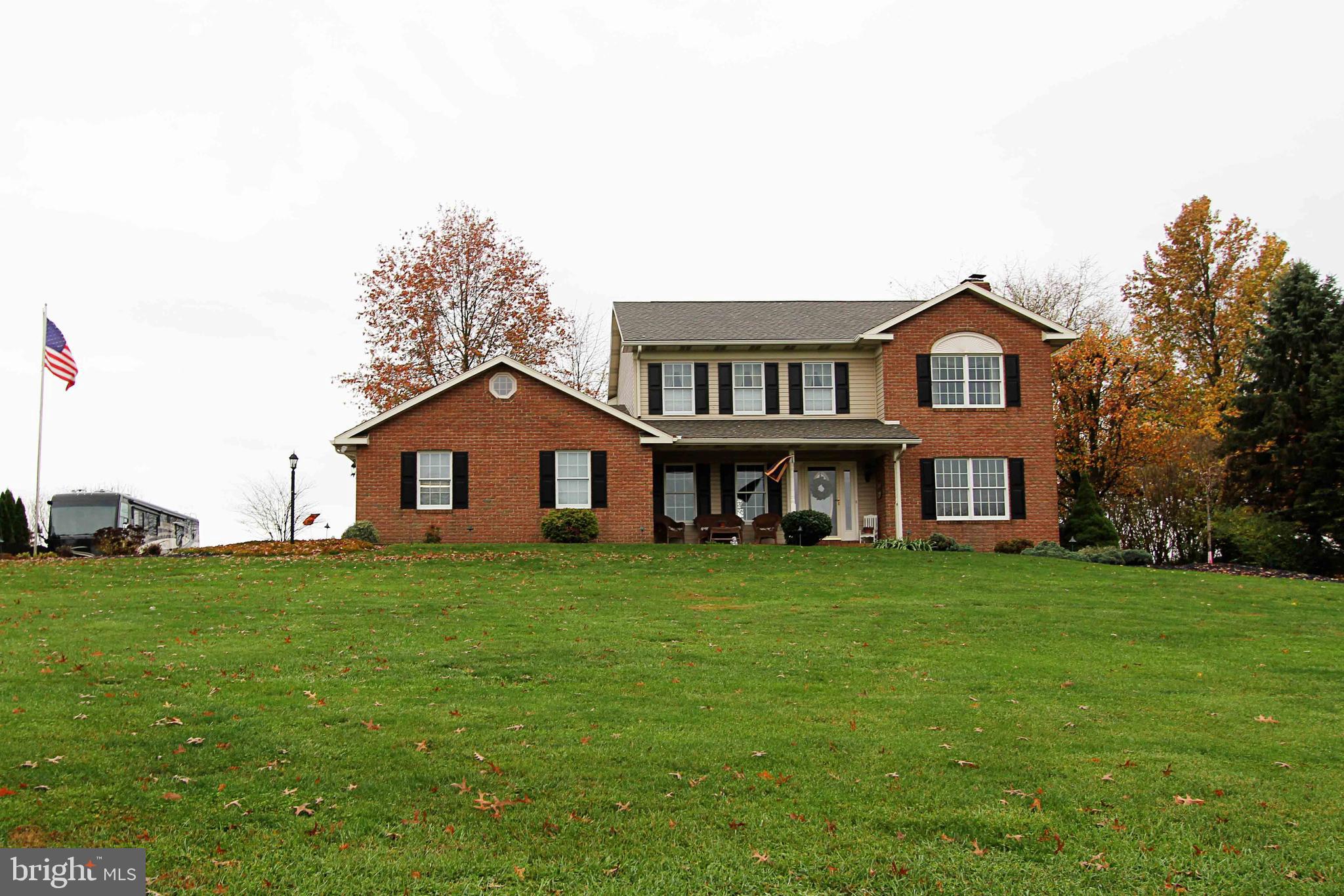189 Mathias Road Littlestown, PA 17340 - Photo 1 of 82 Covered front porch with view of farmland