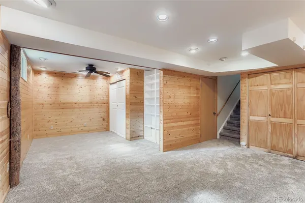wooden floor in an empty room with a glass door