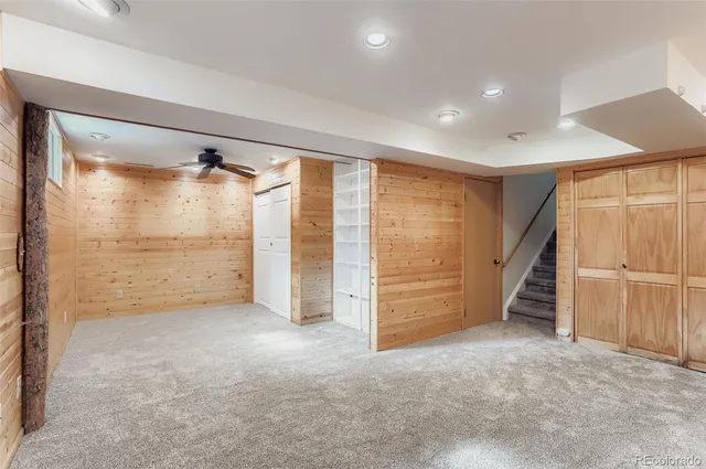 wooden floor in an empty room with a glass door